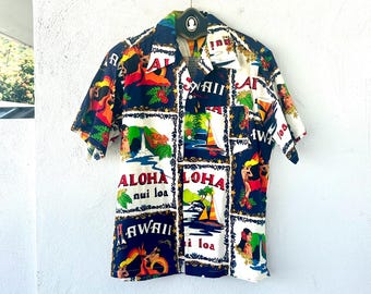 May include: Short-sleeved Hawaiian shirt with a vibrant print. The shirt features a collage of images including waterfalls, sailboats, and figures, with the word "Aloha" and "Hawaii" prominently displayed. The shirt has a button-down front and a collared neckline.