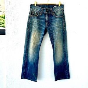 Calça jeans vintage Levi&#39;s Premium Jeans escura