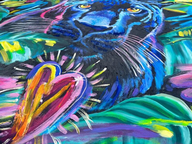 May include: A colorful abstract painting featuring a black panther with blue fur and a bright pink heart. The background is a mix of green, blue, and purple.