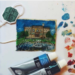 Des Moines World Food Prize Hall miniature oil painting on green tea bag framed.