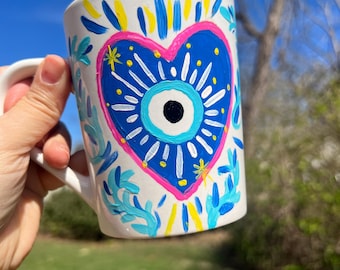 Hand-Painted Ceramic Mug: Folk Art Heart with Eye Design