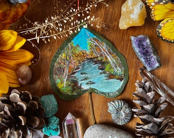 Pintura de paisagem inspirada em Bob Ross em folha natural