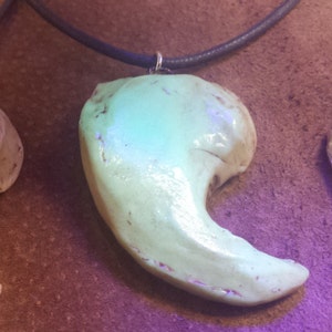 Beautiful African Lion (Sadie) Claw Replica Pendant in Glow-in-the-Dark Polymer Clay.