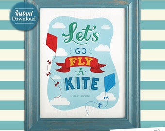 May include: A blue framed printable with a quote about flying a kite. The quote reads "Let's go fly a kite" with the words "fly" and "kite" in red and yellow. The quote is attributed to Mary Poppins. The background is a blue sky with white clouds and two kites, one red and one blue.