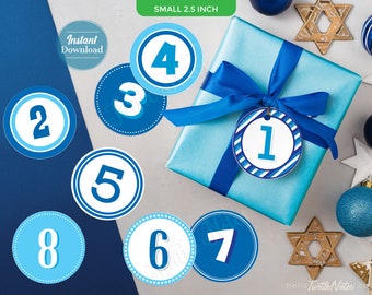May include: A collection of blue and white numbered tags, ranging from 1 to 8, with a gift wrapped in light blue paper and a blue ribbon. The tags are 2.5 inches in diameter and are labeled "Instant Download".