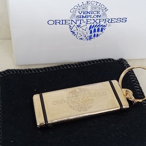 Venice Simplon Orient Express Gold Tone Ingot Keyring.   In Original Presentation Box with carry case.   Luxurious Design.