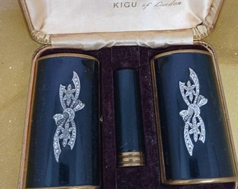 Kigu Luxury Vanity Set.  Powder Compact , Lipstick Case & Cigarette Case. Black Enamel and Marcasite. In Original Presentation Box.