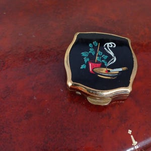 Cenicero portátil Stratton, esencial para damas de los años 60, con diseño de planta de interior. Estilo moderno de mediados de siglo.