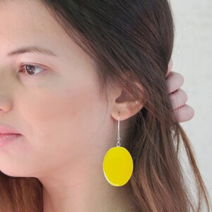 Yellow big oval lightweight earrings, made of resin. Bright and bold, a feel-good pair of earrings