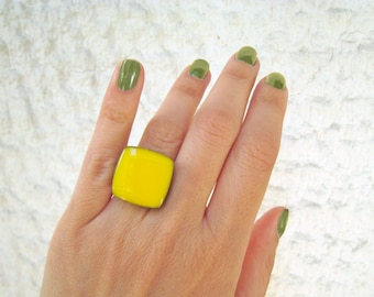 Yellow square ring, made of resin, with a silver tone band. Bright and bold, a feel-good ring that makes a statement. Candycore trend ready!