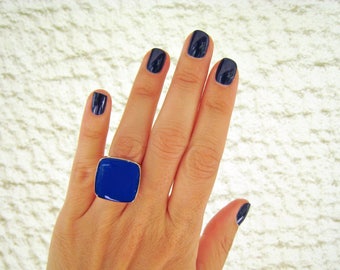 Lapis blue square ring, made of resin, with a silver tone band. A beautiful ring, in a deep and dramatic blue color