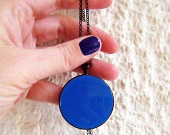 Lapis blue big round black pendant necklace, made of resin. Monochrome & minimal, makes a statement with its beautiful blue color