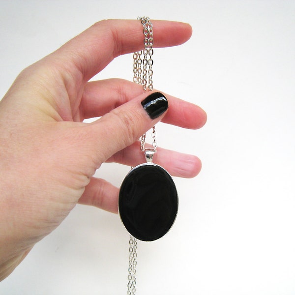 Onyx black big oval silver-tone pendant necklace, made of resin. Monochrome & minimal, makes a statement with its beautiful black color