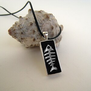 Black fishbone necklace, made of resin. A unique surfer necklace
