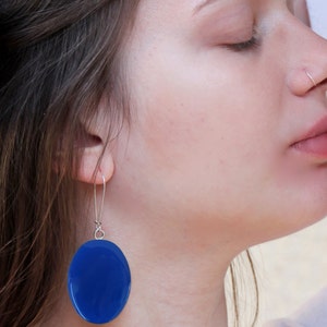 Lapis blue big oval lightweight earrings, made of resin. A beautiful pair of earrings, in a deep and dramatic blue color