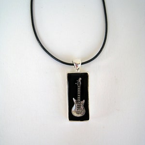 Electric guitar black necklace, made of resin. A unique gift for musisians, singers, music teachers, guitarists