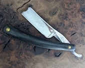 Wade butcher celebrated barber use straight razor