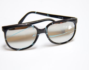 how to get paint off glasses lens