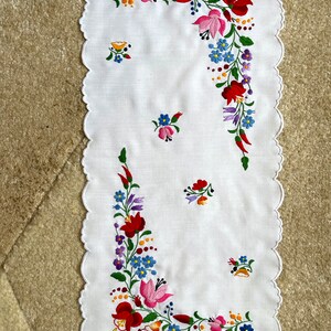 Hand embroidered tablecloth. Traditional Hungarian Kalocsa’s embroidery.