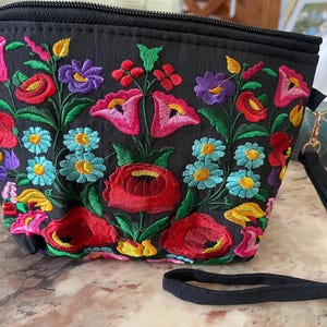 Embroidered beautiful small handbag. Cosmetic bag.