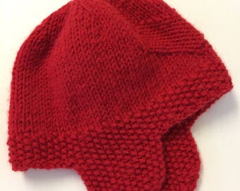 PDF knitting pattern to make a baby girls heart trapper hat earflap hat in 3 different sizes using double knit wool