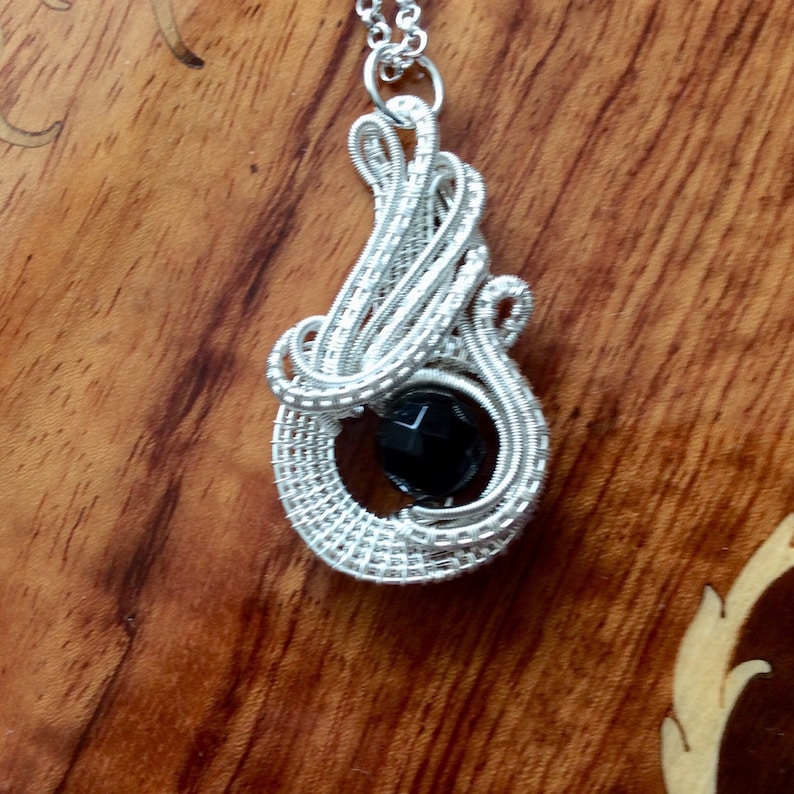 wirework pendant UK seller handmade pendant Swirly silver and faceted black quartz pendant