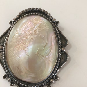 Sterling silver broach with a cameo