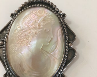 Sterling silver broach with a cameo