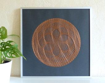 Hand embroidered paper tableau copper crossed threads rosette design.modern craft embroidery.wall art.art craft creation.textile design