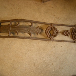 cast iron implement-yard decor-garden art-plant support-fence hanging-