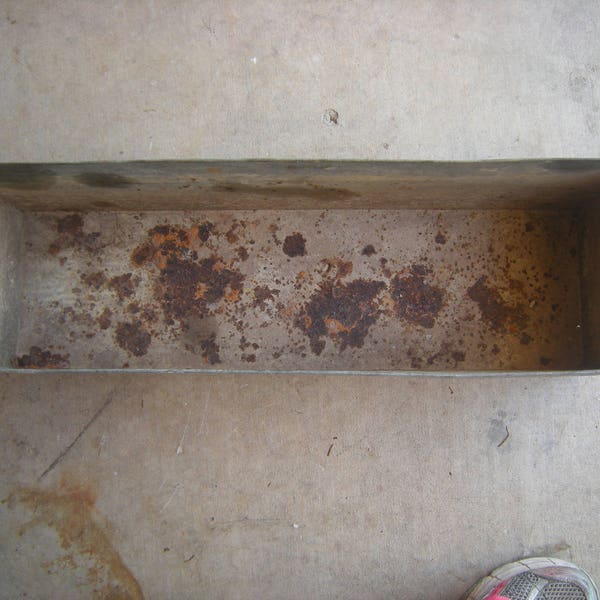 old metal bin-tin bin-garage storage-organization-planter-window box- shelf-man cave-rusty-rustic-