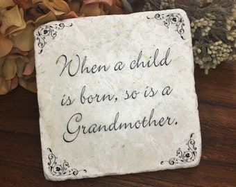 Grandparent gift.  When a Child is Born, so is a Grandmother. Tumbled marble keepsake quote on plaque.