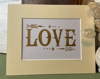 LOVE letterpress print, Love wall art in gold.