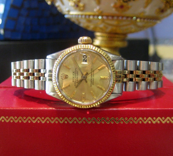 rolex stainless steel gold