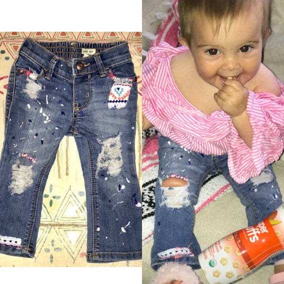 baby destroyed jeans
