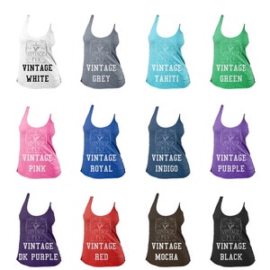 May include: Image showcasing a variety of tank tops in different colors, including white, grey, blue, green, pink, purple, red, and black. Each tank top features the text "VINTAGE FLY" and the color name. The text "AVAILABLE SHIRT COLORS FOR THIS LISTING" is at the top.