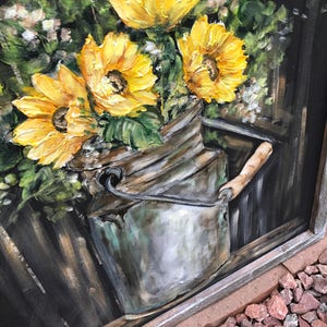 Vintage milk jug with sunflowers