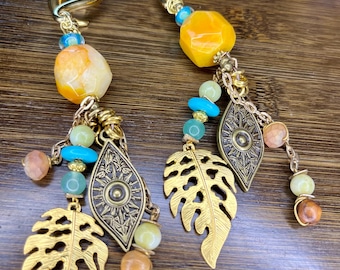 Adornos de bruja con pesas para las orejas