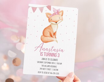 May include: A pink and white birthday invitation with a cartoon fox wearing a pink bandana. The invitation says "Anastasia is turning 3" and includes details for the party, including the date, time, location, and RSVP information.