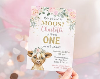 May include: A pink and gold invitation with a floral design and a cartoon cow. The invitation reads "Have you heard the MOOS? Charlotte is turning ONE. Join us to celebrate Saturday, April 15th 4:00 p.m. Charlotte's House 789 West Street Eaton, IL. 34523 RSVP to Jennifer Smith at 354-190-2398"