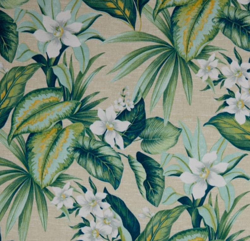 May include: A tropical floral pattern featuring white flowers and large green leaves with blue and yellow accents. The design is set against a beige background, creating a vibrant and natural aesthetic. This pattern is suitable for fabric or wallpaper.