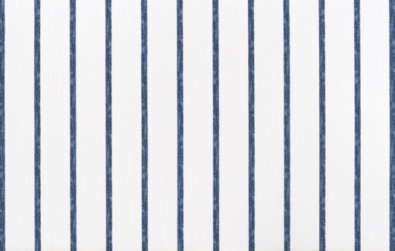 May include: White fabric with vertical blue stripes. The stripes are evenly spaced and run the length of the fabric.