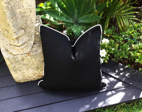 White outdoor cushions with black piping hotsell
