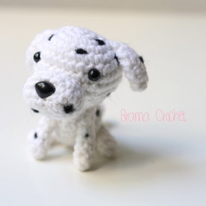 Dalmatian dog handmade crochet keychain. Amigurumi kawaii doll