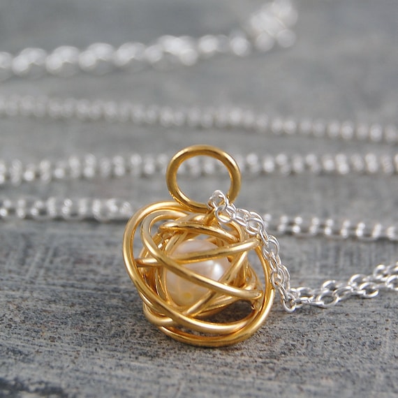 Caged pearl deals necklace