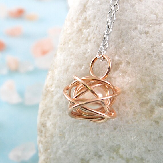Caged pearl necklace sale