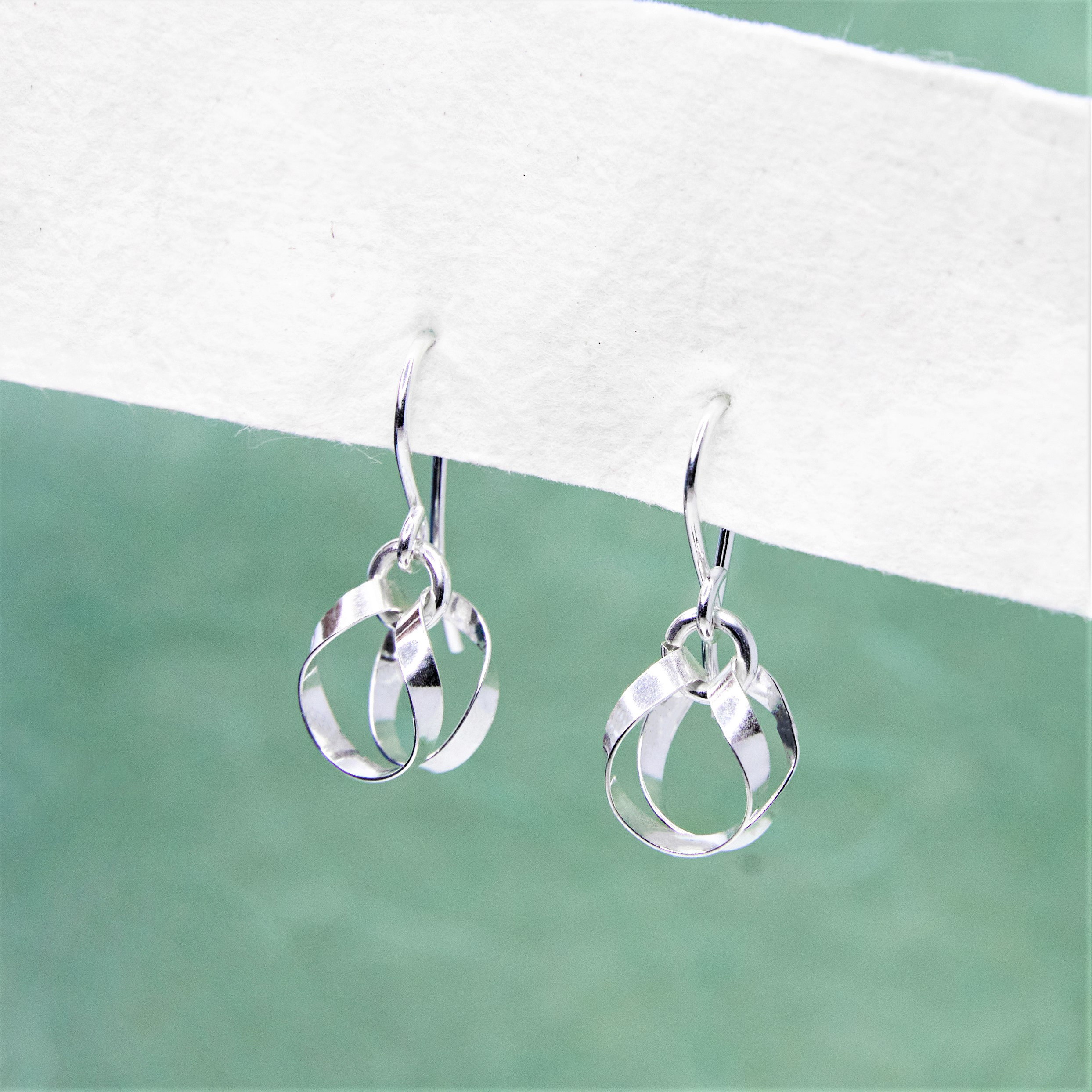 Dainty silver shop dangle earrings