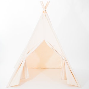 May include: A white canvas teepee tent for kids, with wooden poles and a flap that can be opened or closed.