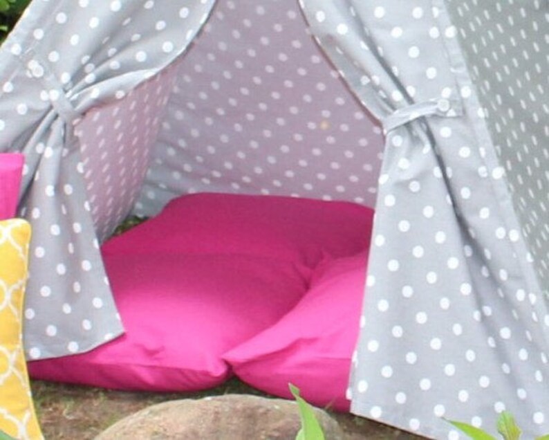 pink teepee with floor mat