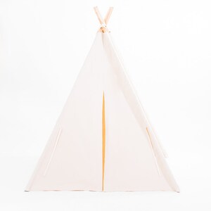 May include: A white canvas teepee tent with a wooden frame. The tent has a flap that can be opened and closed.